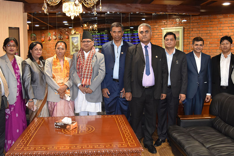 Speaker Krishna Bahadur Mahara (fourth from left) along with other delegates poses for a portrait before embarking on a five-day official visit to China, at TIA in Kathmandu, on Friday, September 07, 2018. Courtesy: RSS