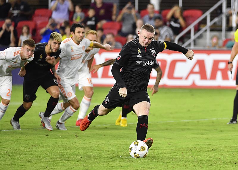 DC United forward Wayne Rooney (9) scores a goal on a penalty kick against the Atlanta United during the second half at Audi Field, in Washington, DC, USA, on Sep 2, 2018. Photo: Brad Mills-USA TODAY Sports via Reuters