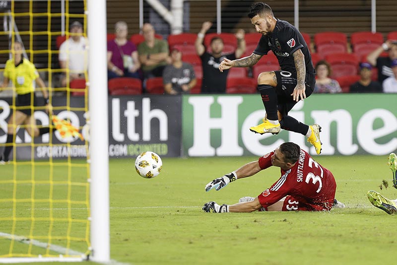 DC United midfielder Luciano Acosta (10) attempts to shoot the ball Minnesota United FC goalkeeper Bobby Shuttleworth (33) in the first half at Audi Field, in Washington, DC, USA, on September 12, 2018. Photo: Geoff Burke-USA TODAY Sports via Reuters