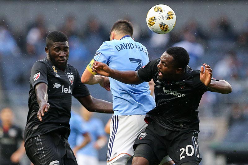 New York City forward David Villa (7) fights with D.C. United defender Jalen Robinson (20) for a high ball during the first half at Yankee Stadium, in New York, NY, USA, on Sep 8, 2018. Photo: Vincent Carchietta-USA TODAY Sports via Reuters
