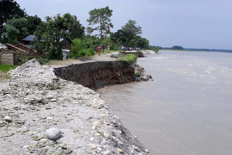 Locals observe swollen Narayani river in Chitwan district, on Tuesday, September 04, 2018. Photo: Tilak Ram Rimal