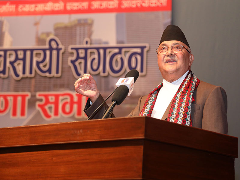 Prime Minister and Co-Chair of Nepal Communist Party (NCP) KP Sharma Oli addressing the 'unification announcement programme' organised by Nepal Contractors' Organisation in Kathmandu, on Saturday, September 15, 2018. Photo: RSS