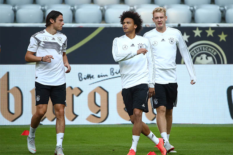 Germany's Nico Schulz, Leroy Sane and Julian Brandt during training. Photo: Reuters