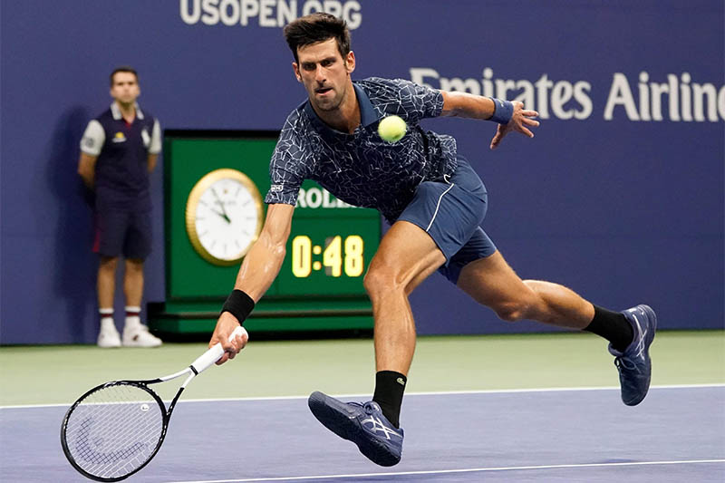Novak Djokovic of Serbia hits to Richard Gasquet of France in a third round match on day six of the 2018 US Open tennis tournament at USTA Billie Jean King National Tennis Center. Mandatory Credit: Robert Deutsch-USA TODAY Sports