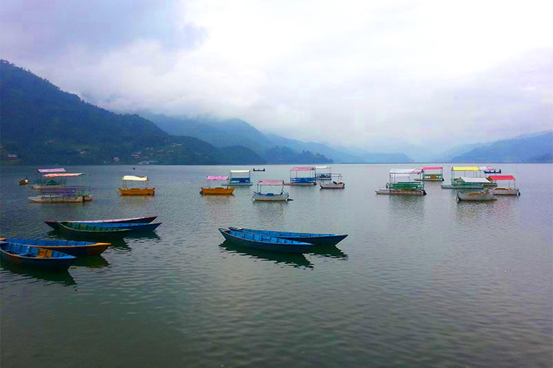A view of boats moored on Phewa Lake, against the backdrop of hills, in Pokhara of Kaski district, on Thursday, September 27, 2018. Photo: Rup Narayan Dhakal/THT