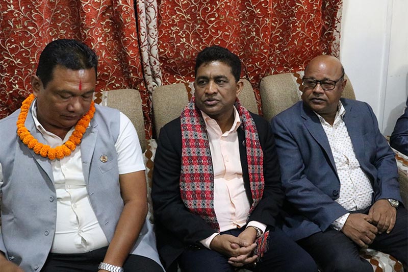 Minister for Physical Infrastructure and Transport Raghubir Mahaseth (centre) speaks with mediapersons while Province 1 Minister for Industry, Tourism, Forests and Environment, Jagadish Prasad Kusiyat (right) and federal parliamentarian Aman Lal Modi accompany the former, at Biratnagar Airport, in Morang district, on Monday, September 3, 2018. Photo: RSS