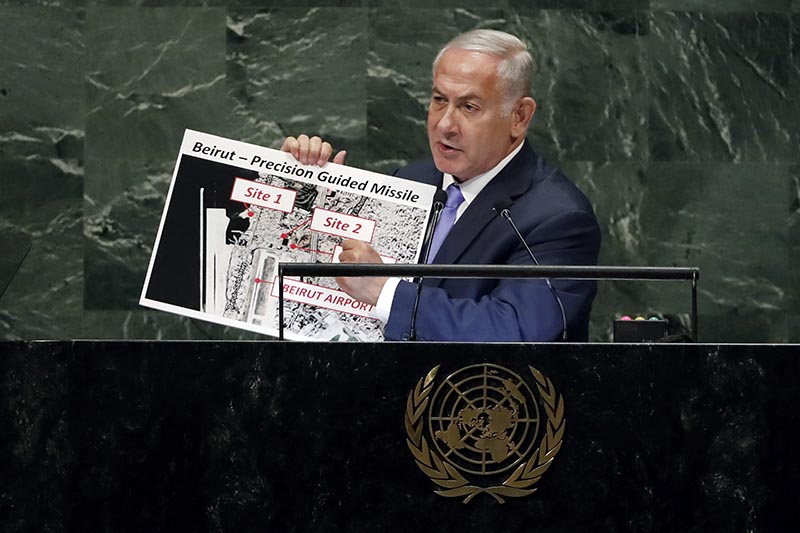 Israel's Prime Minister Benjamin Netanyahu shows guided missile sites in Beirut during his address of the 73rd session of the United Nations General Assembly, at U.N. headquarters, on Thursday, September 27, 2018. Photo: AP