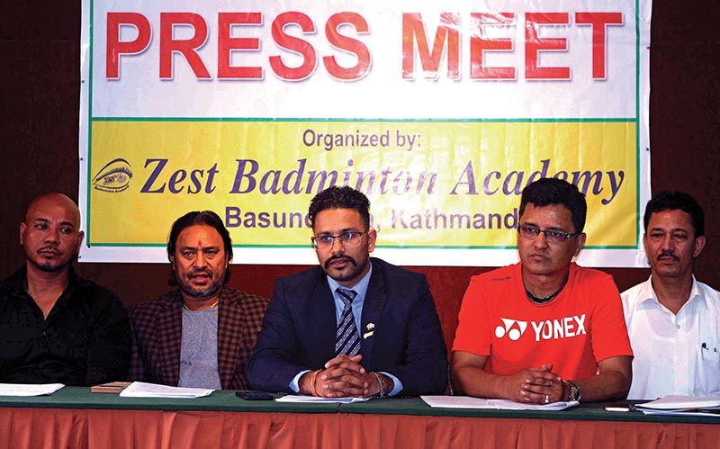 President of Zest Badminton Academy Madhu Sudan Pathak (centre) reacts during a press meet in Kathmandu on Monday. Photo: THT