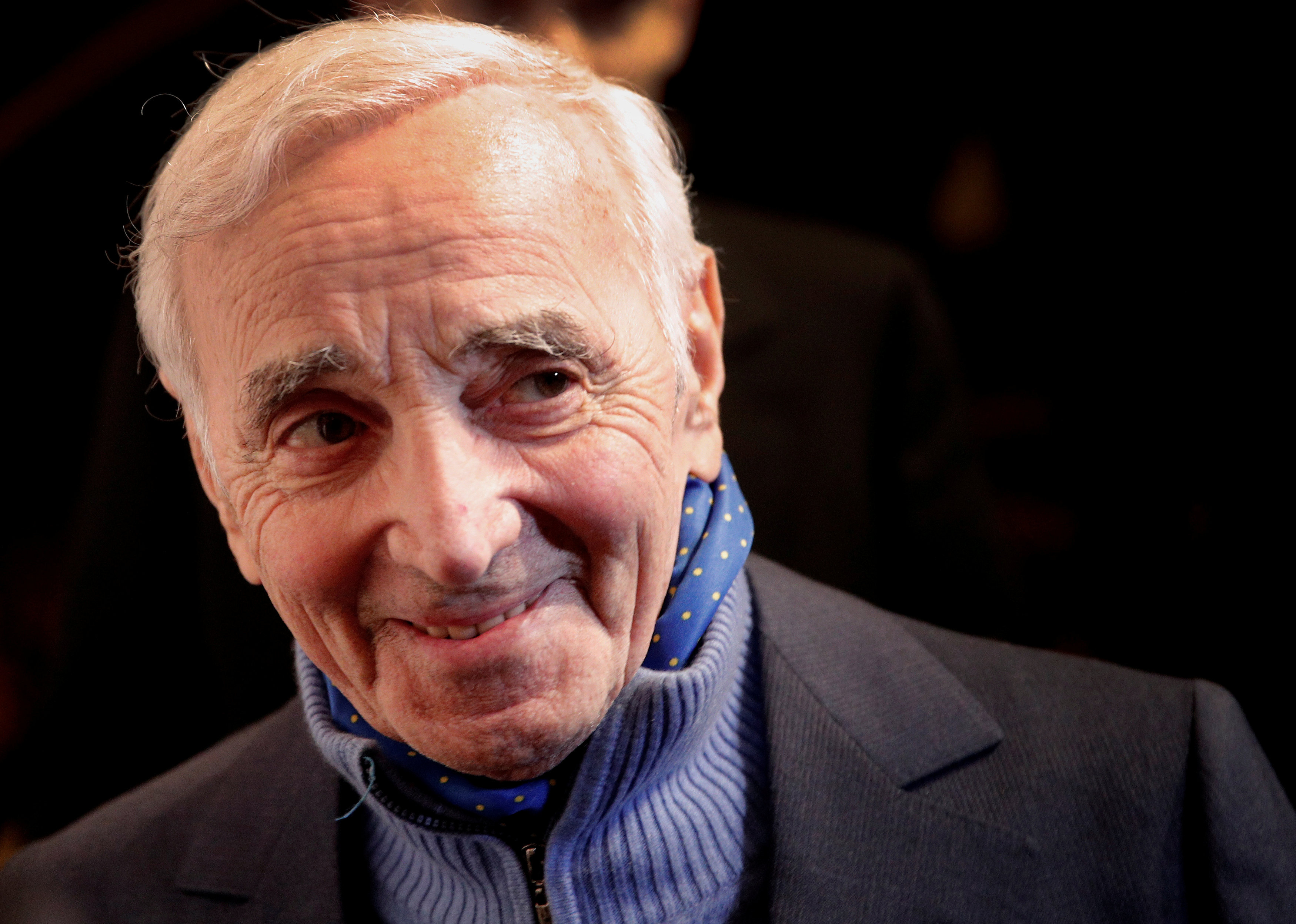 FILE PHOTO: French singer Charles Aznavour attends the annual dinner of CCAF (Co-ordination Council of Armenian organisations of France), in Paris, France, February 8, 2017. Picture taken February 8, 2017.   Photo: REUTERS