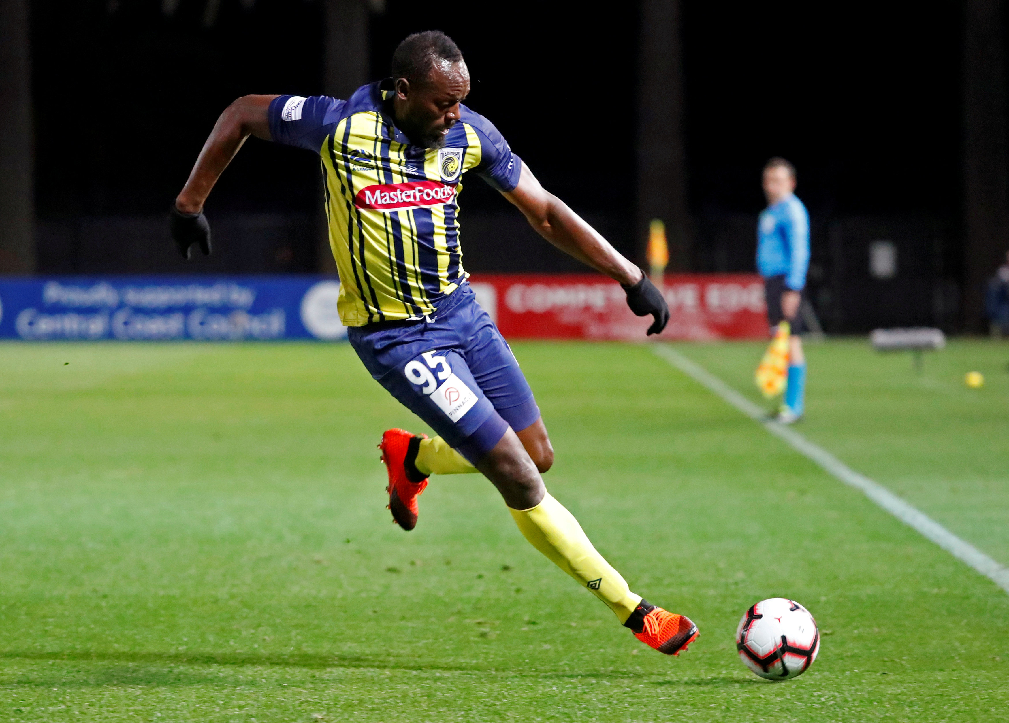 FILE PHOTO: Soccer Football - Central Coast Mariners v Central Coast Select - Central Coast Stadium, Gosford, Australia - August 31, 2018  Central Coast Mariners' Usain Bolt in action.  REUTERS