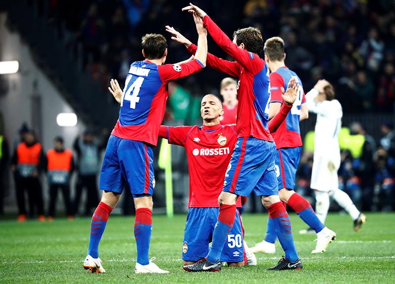 CSKA Moscow's Rodrigo Becao celebrates with Kirill Nababkin and Mario Fernandes after the Champions League, Group G match between CSKA Moscow and  Real Madrid, at VEB Arena, in Moscow, Russia, on October 2, 2018. Photo: Reuters