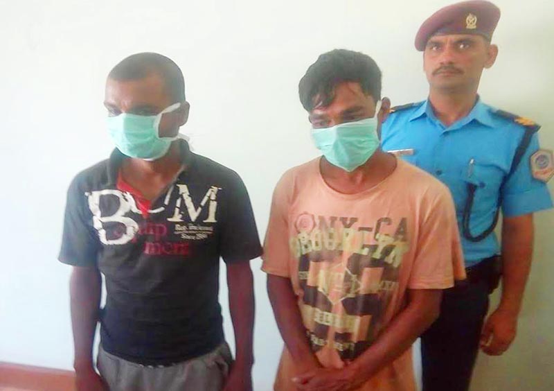 Police making public two persons arrested on the charges of rape and murder, in District Police Office, Dhanusha, on Sunday, October 14, 2018. Photo: THT