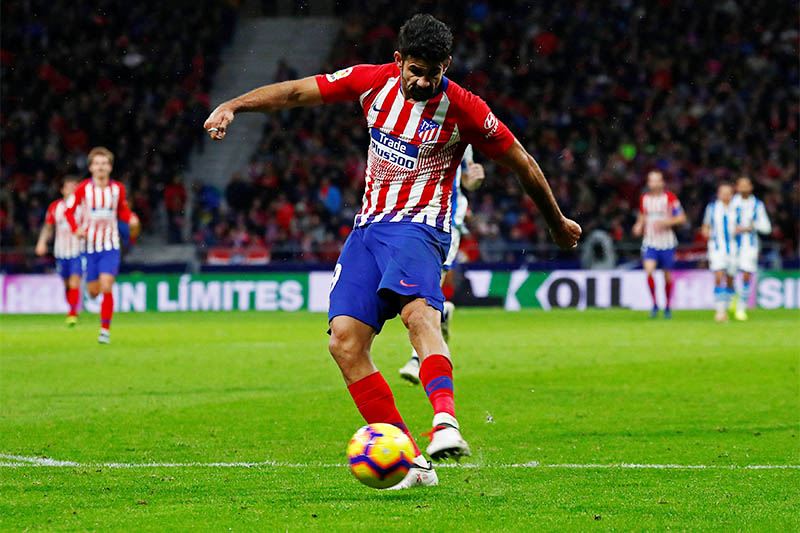Atletico Madrid's Diego Costa shoots at goal. Photo: Reuters