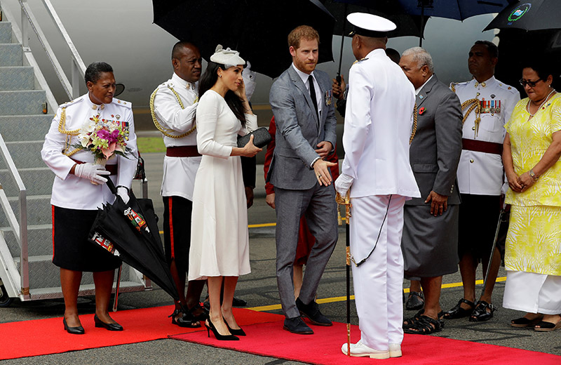 Britain's Prince Harry and Meghan, Duchess of Sussex, arrive in Suva, Fiji, on Tuesday, October 23, 2018. Photo: Kirsty Wigglesworth/Pool via REUTERS