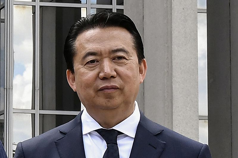 INTERPOL former President Meng Hongwei poses during a visit to the headquarters of International Police Organisation in Lyon, France, May 8, 2018. Photo: Reuters