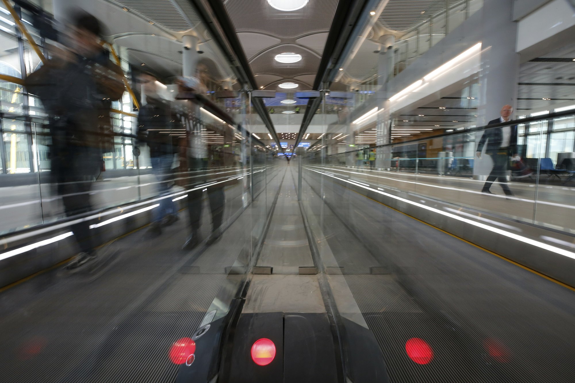 In this photo, workers walk inside a terminal at Istanbul's new airport, ahead of its opening on Oct. 25, 2018. Photo: AP