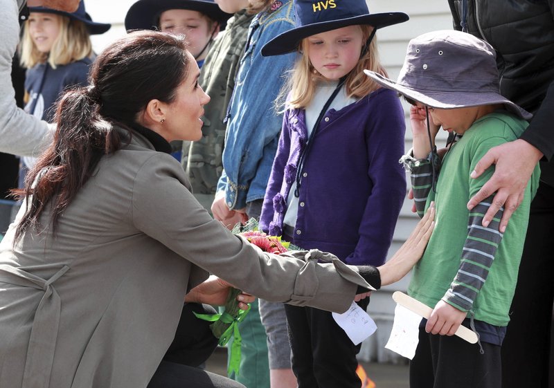 Meghan, Duchess of Sussex consoles Joe Young following a meeting with young people from a number of mental health projects operating in New Zealand in Wellington, New Zealand, on Monday, Oct. 29, 2018. Photo: AP
