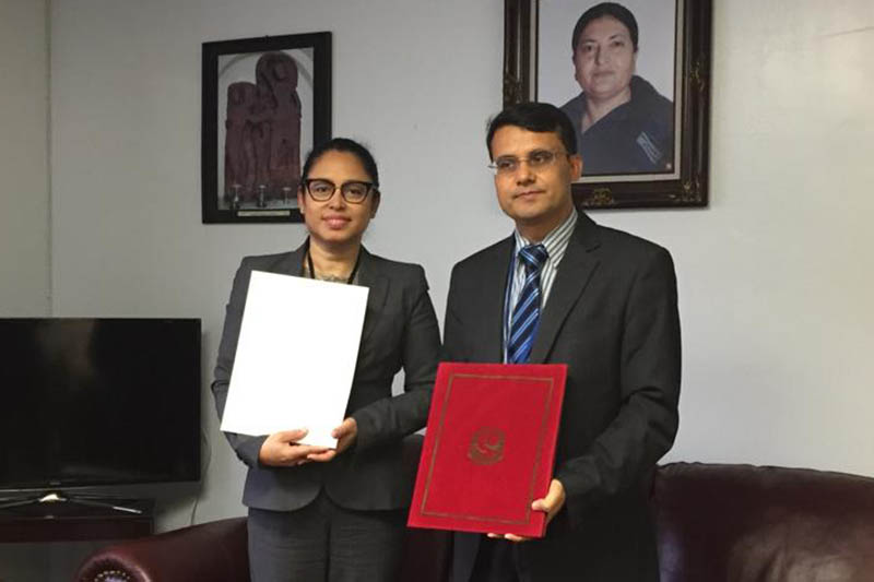 Diplomats from Nepal and Suriname sign an agreement to establish diplomatic relations in New York. Courtesy: MoFA