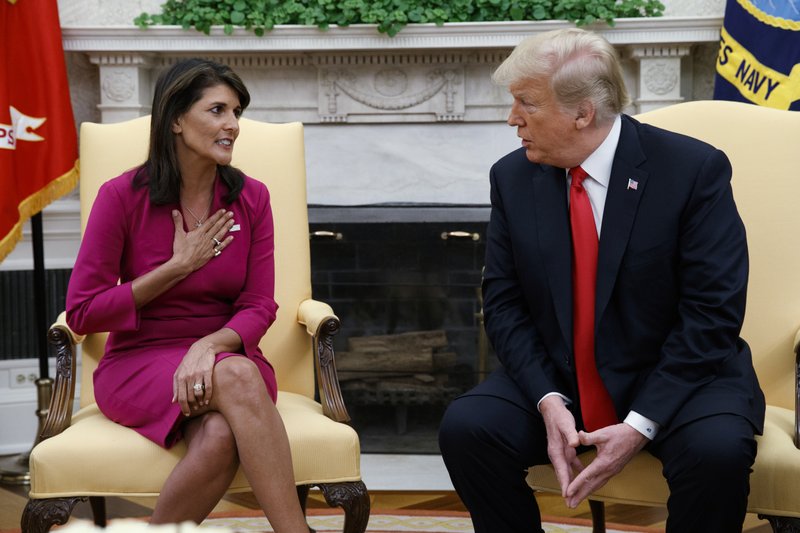 President Donald Trump meets with outgoing U.S. Ambassador to the United Nations Nikki Haley in the Oval Office of the White House, on Tuesday, Oct. 9, 2018, in Washington. n