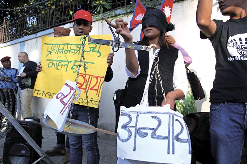 PHOTO: Activists staging a protest in front of the porime minister's official residence, seeking justice for Nirmala Panta, in kathmandu, on Saturday, October 13, 2018. Photo: THT