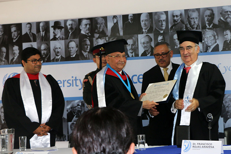 Prime Minister KP Sharma Oli being awarded the degree of u2018doctor honoris causau2019 at a special convocation organised in San Jose, Costa Rica, on Monday, October 1, 2018. The honorary doctorate was conferred on the Prime Minister in recognition of his contribution to achieving peace and democracy in Nepal. Photo: RSS