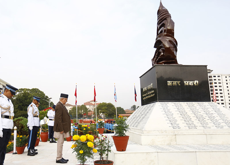 Prime Minister KP Sharma Oli pays tribute to the deceased policemen during a special function held to mark the Police Day at Police Headquarters, in Kathmandu, on Thursday, October 11, 2018. Photo: Skanda Gautam/THT