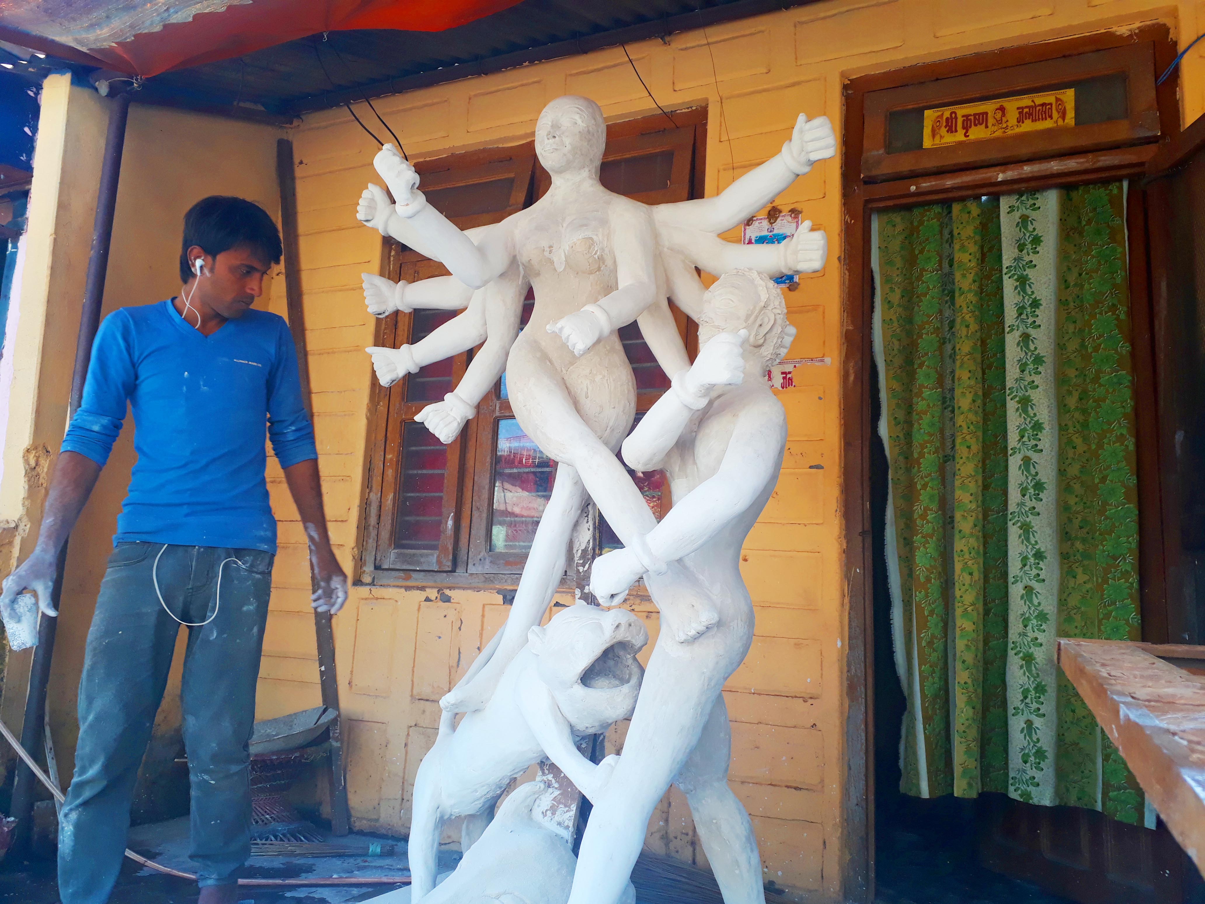 A sculptor making sculpture of Durga Bhawani in view of Bada Dashain festival, in Bagale Tole, Pokhara, on Monday, October 8, 2018. Photo: Rishi Ram Baral/THT