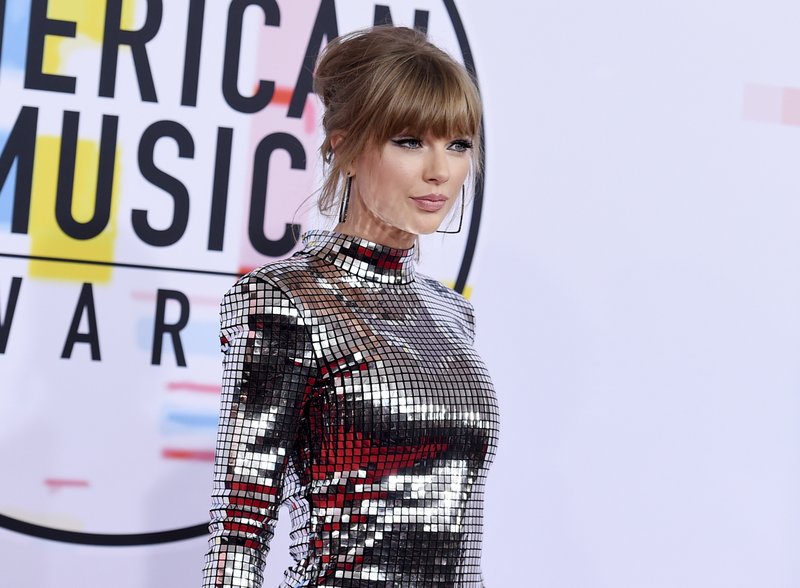 FILE - In this  photo, Taylor Swift arrives at the American Music Awards at the Microsoft Theater in Los Angeles. Photo: AP