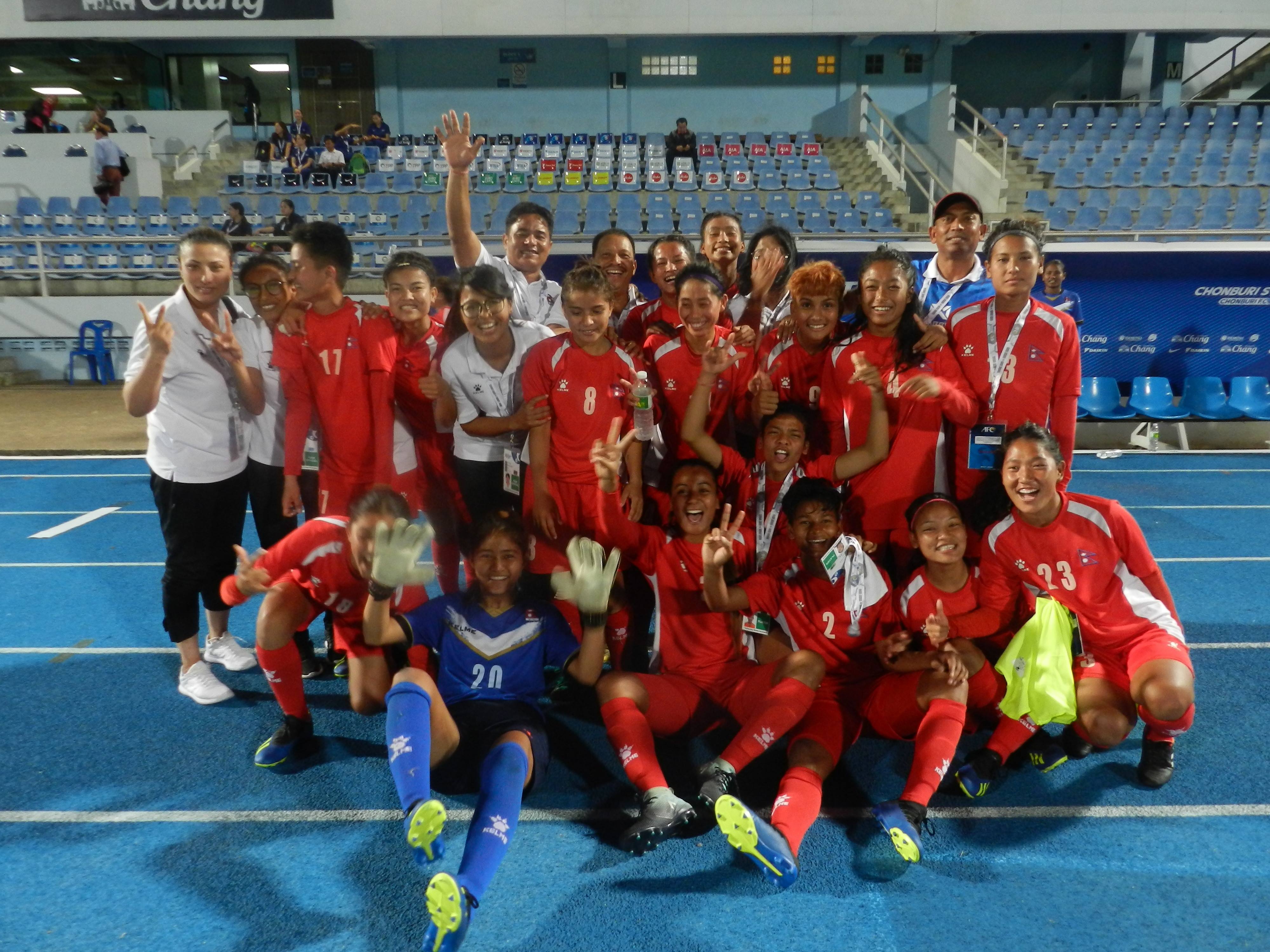 Nepali team members celebrate their victory over India in the AFC U-19 Womenu2019s Championship match at the Chonburi Stadium in Thailand on Friday, October 26, 2018. Photo: AP