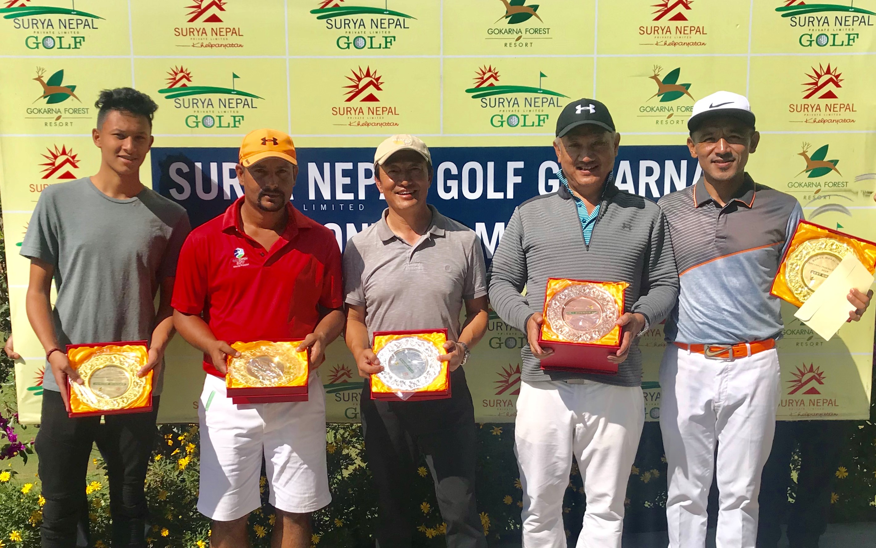 (From left) Arnav Shah, Surendra Phuyal, Phintso Ongdi Lama, Ang Tshiring Sherpa and Tashi Tsering after the Surya Nepal Gokarna Monthly Medal at the Gokarna Golf Club in Kathmandu on Saturday, October 13, 2018. Photo: THT