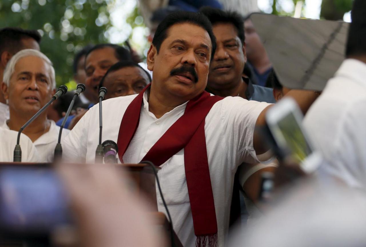 FILE: Former Sri Lankan president Mahinda Rajapaksa speaks to his supporters at his residence in Medamulana July 1, 2015. REUTERS