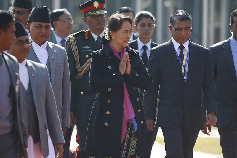 State Counsellor of Myanmar Aung San Suu Kyi gestures upon her arrival to attend the Asia Pacific Summit 2018, at Tribhuvan International Airport, in Kathmandu, on Thursday, November 29, 2018. Photo: Skanda Gautam/THT