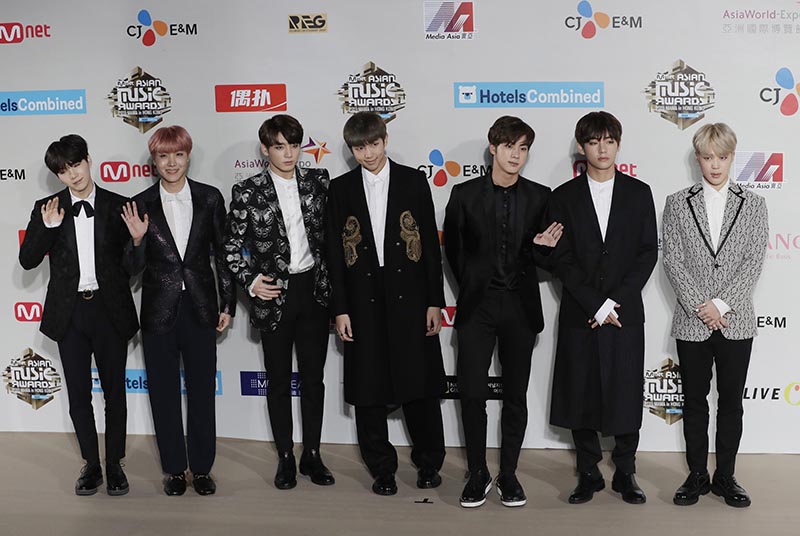 Members of South Korean K-Pop music band BTS pose for photos on the red carpet of the 2016 Mnet Asian Music Awards (MAMA) in Hong Kong, on December 2, 2016. Photo: AP/ file
