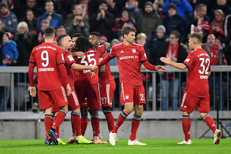 Bayern Munich's Serge Gnabry celebrates scoring their first goal with team mates. Photo: Reuters
