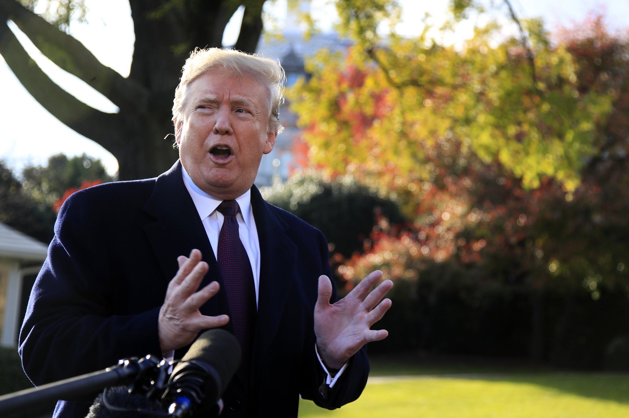 President Donald Trump speaks to the media before leaving the White House in Washington, on Tuesday, Nov. 20, 2018, to travel to Florida, where he will spend Thanksgiving at Mar-a-Lago. Photo: AP