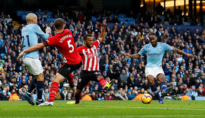 Manchester City's Raheem Sterling scores their fourth goal during the Premier League match between Manchester City and Southampton, at Etihad Stadium, in Manchester, Britain, on November 4, 2018. Photo: Action Images via Reuters