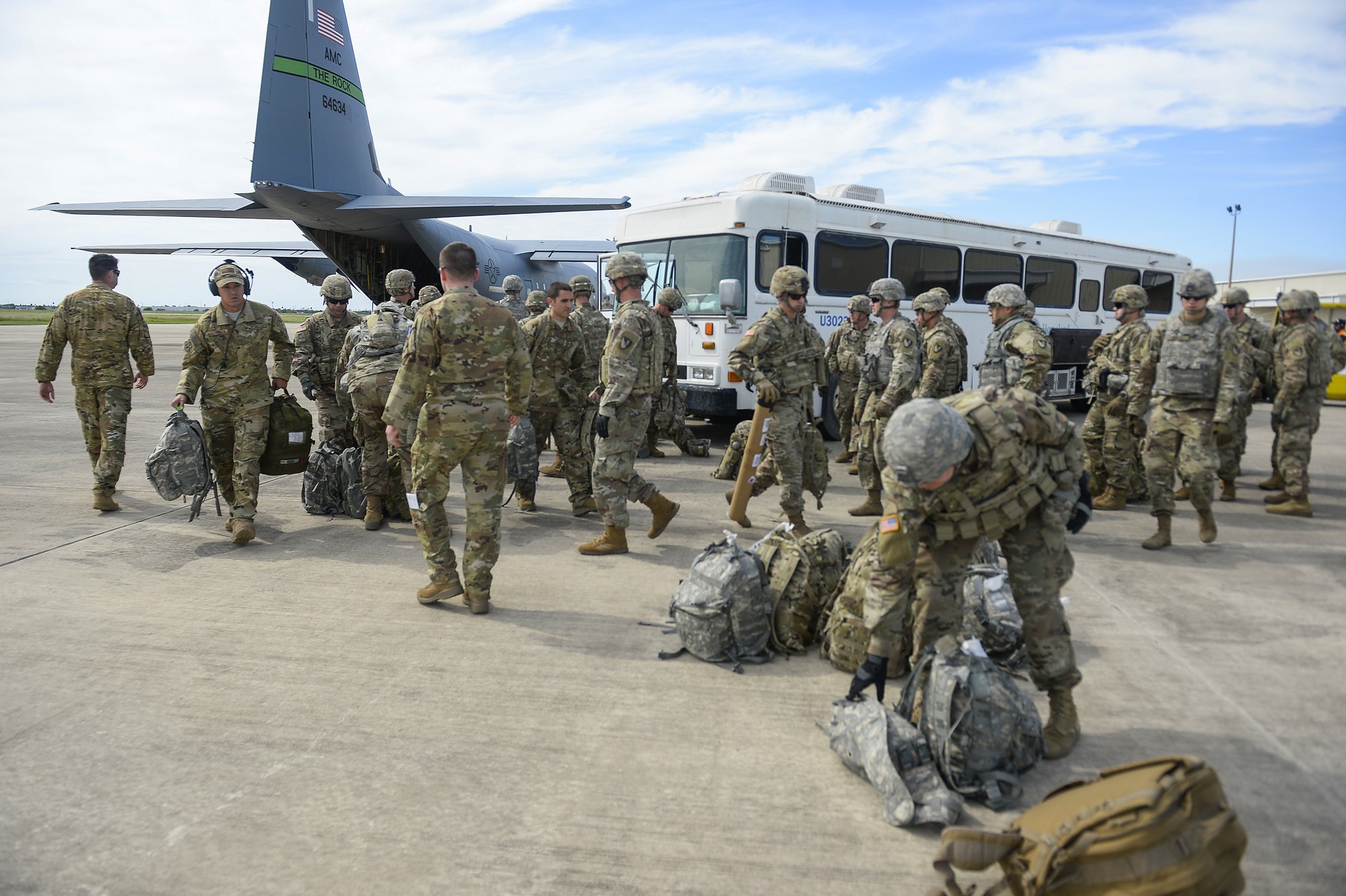 In this photo provided by the US Air Force, soldiers from the the 89th Military Police Brigade, and 41st Engineering Company, 19th Engineering Battalion, Fort Riley, Kan., arrive at Valley International Airport, Thursday, Nov. 1, 2018, in Harlingen, Texas, to conduct the first missions along the southern border in support of Operation Faithful Patriot. Photo: AP