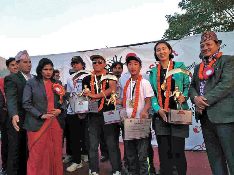 Winner of Paragliding Accuracy World Cup hold the trophies in Sirkot, Syngja on Sunday. Photo: THT