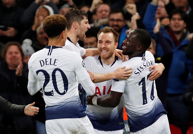 Tottenham's Christian Eriksen celebrates with Ben Davies, Dele Alli and Moussa Sissoko after scoring their first goal during the Champions League, Group Stage Group B match between Tottenham Hotspur and Inter Milan, at Wembley Stadium, in London, Britain, on November 28, 2018.  Photo: Action Images via Reuters