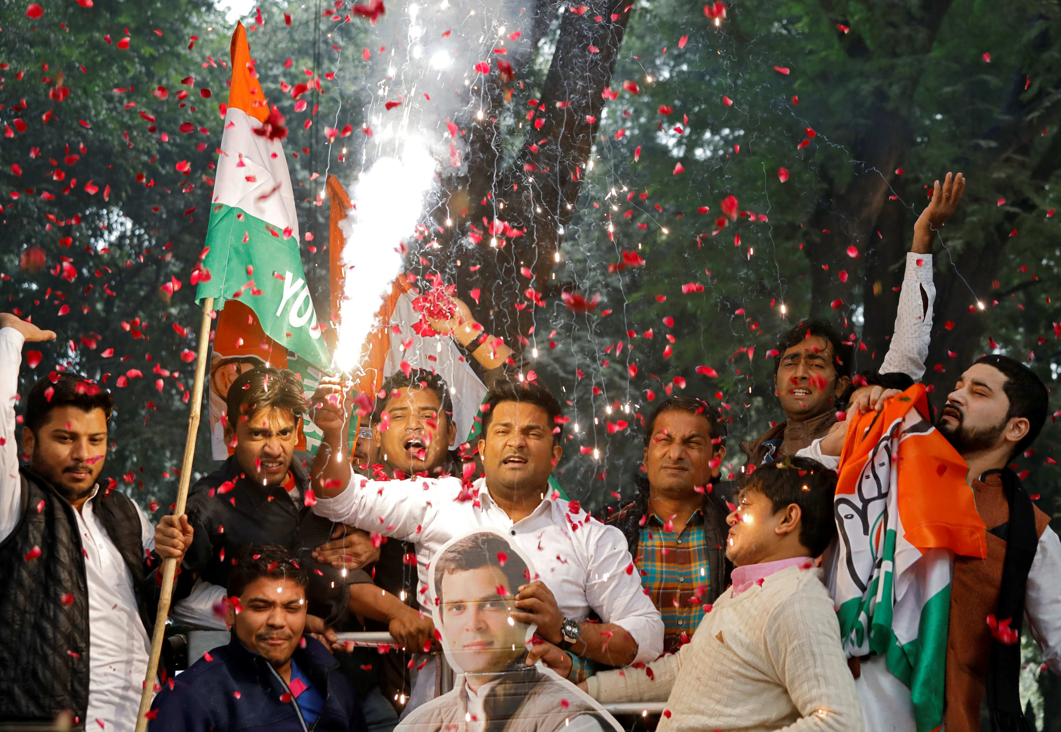 Supporters of India's main opposition Congress party celebrate after initial poll results at the party headquarters in New Delhi, India, December 11, 2018. REUTERS