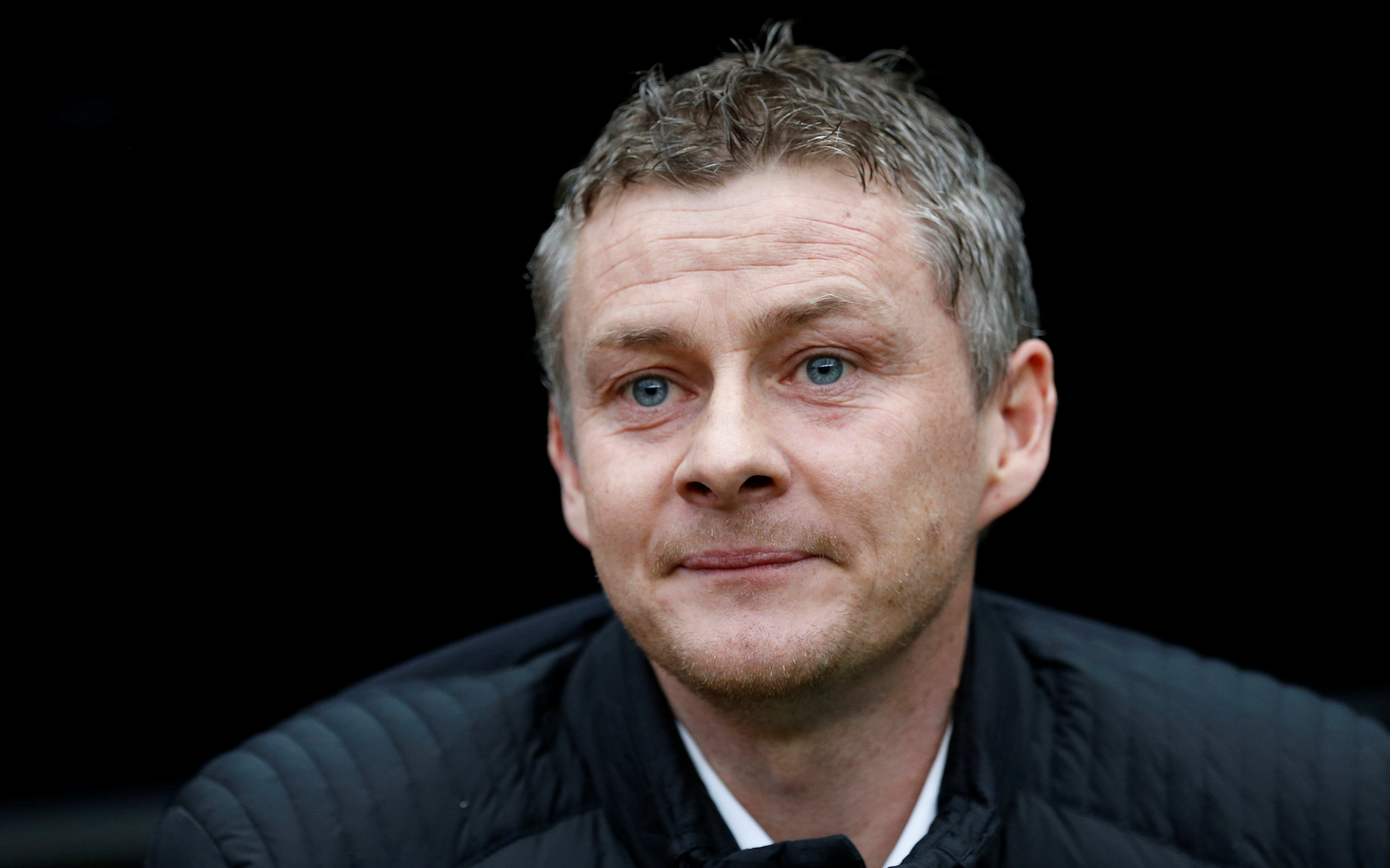 FILE PHOTO: Then Cardiff City manager Ole Gunnar Solskjaer takes his seat before their English FA Cup soccer match against Newcastle United at St. James' Park stadium in Newcastle, northern England January 4, 2014. REUTERS/Russell Cheyne/File Photo