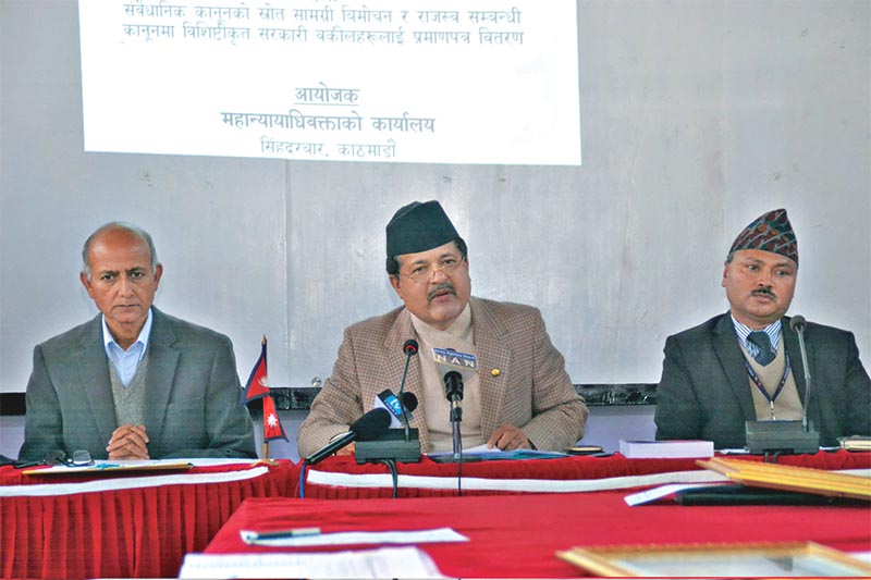 Attorney General Agni Prasad Kharel (centre) speaking at a press conference organised in Kathmandu, on Friday, December 14, 2018. Photo: RSS