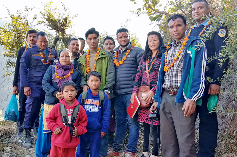 SOS Nepal, government officials pose for a portrait after rescuing two kids in Bajura district, on Sunday, December 02, 2018. Photo: Prakash Singh