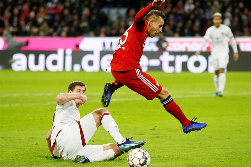 Nuremberg'su00caPatrick Erras in action with Bayern Munich's Rafinha. Photo: Reuters