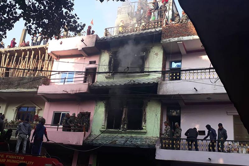 Firefighters dousing the fire that broke out at a house in Tulsipur Sub-metropolitan City, Dang, on Friday, December 14, 2018. Photo: THT