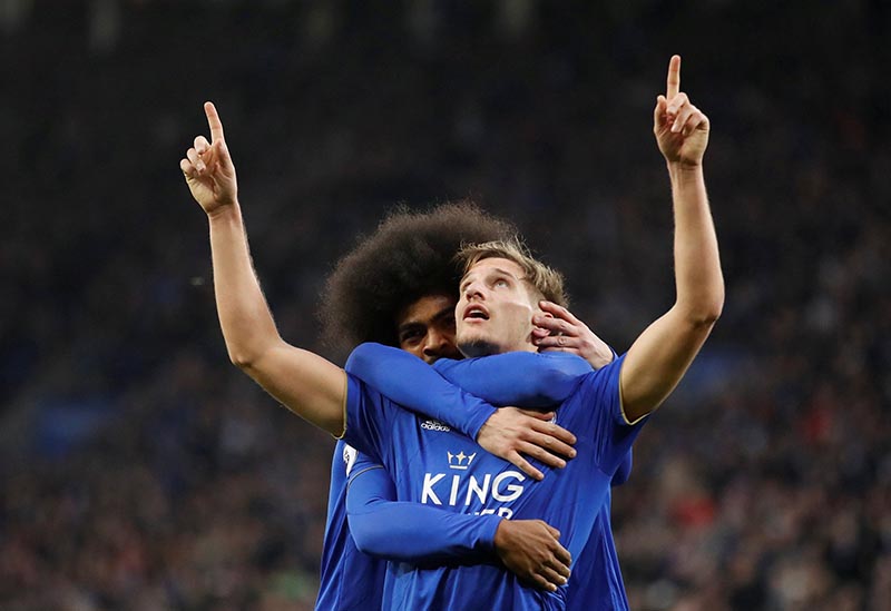 Leicester City's Marc Albrighton celebrates scoring their first goal with Hamza Choudhury during the Premier League match between Leicester City and Manchester City at King Power Stadium, in Leicester, Britain, on December 26, 2018. Photo: Action Images via Reuters