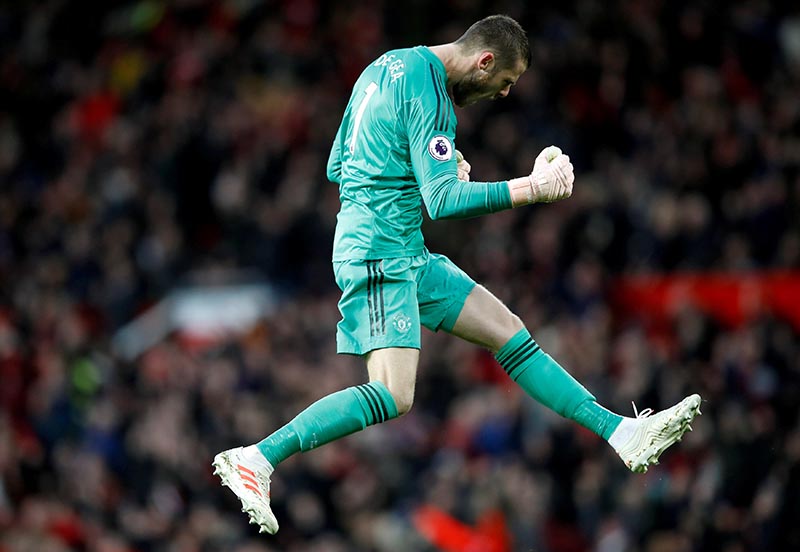Manchester United's David de Gea celebrates after Juan Mata scores their second goal during the Premier League match between Manchester United and Fulham, at Old Trafford, in Manchester, Britain, on December 8, 2018. Photo: Action Images via Reuters