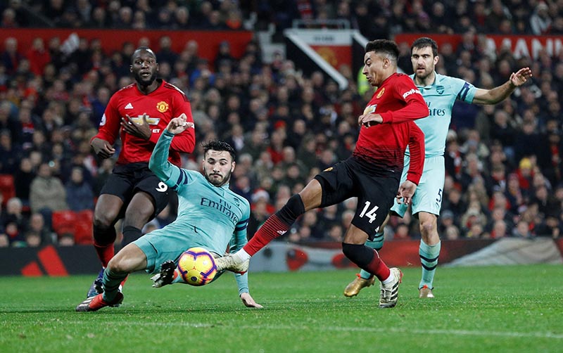 Manchester United's Jesse Lingard scores their second goal during the Premier League match between Manchester United and Arsenal, at Old Trafford, in Manchester, Britain, on December 5, 2018. Photo: Reuters