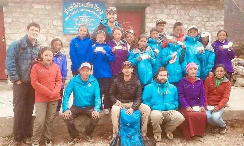 Schoolchildrenu00a0 posing for a photo with the representatives of organisations that have extended financial support for their education, in Namche, Solukhumbu, on Saturday. Photo: THT