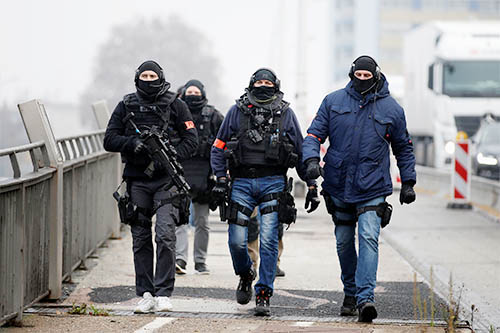Members of French special police forces of Research and Intervention Brigade (BRI) patrol at the French-German border the day after a shooting in Strasbourg, France, December 12, 2018. Photo: Reuters